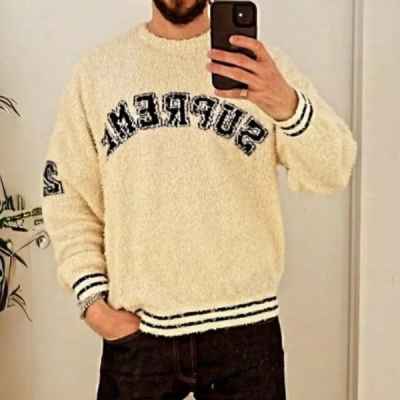 슈** 텍스쳐드 아크 스웨터